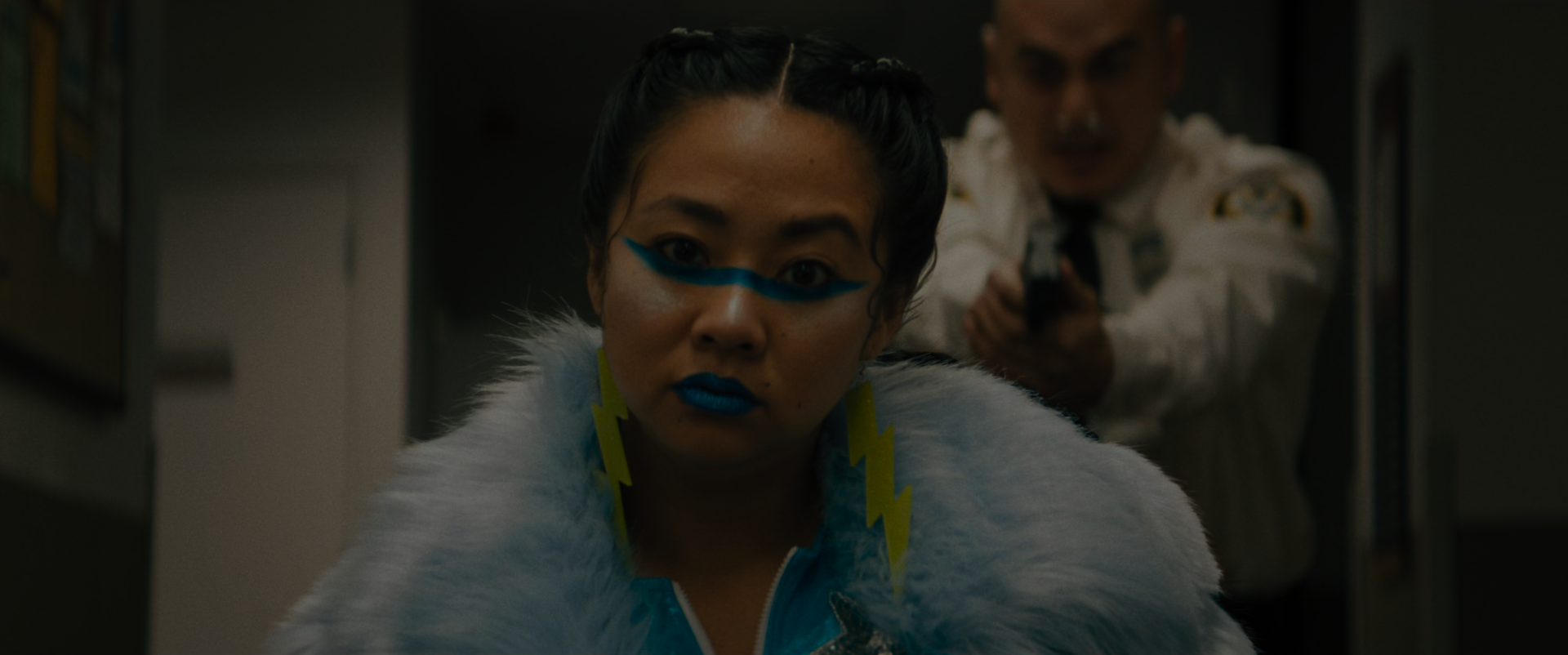 EEAAO Screenshot- Closeup of Jobu's earrings and blue punk makeup