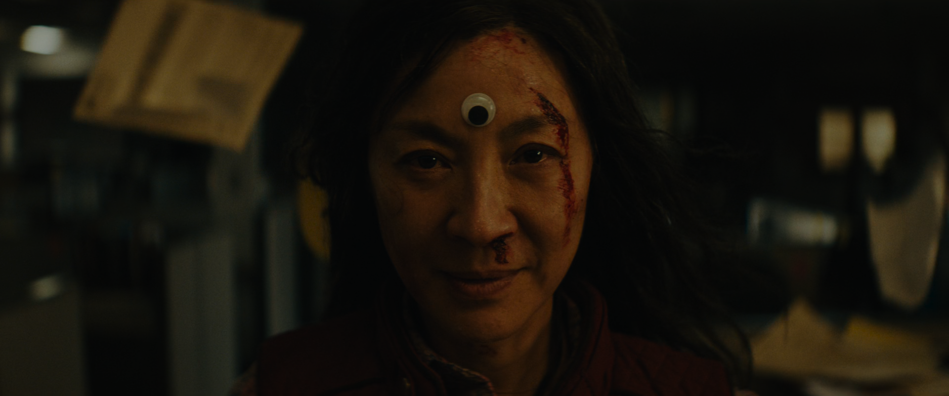 EEAAO Screenshot- Evelyn Wang wearing the googly eye on her forehead