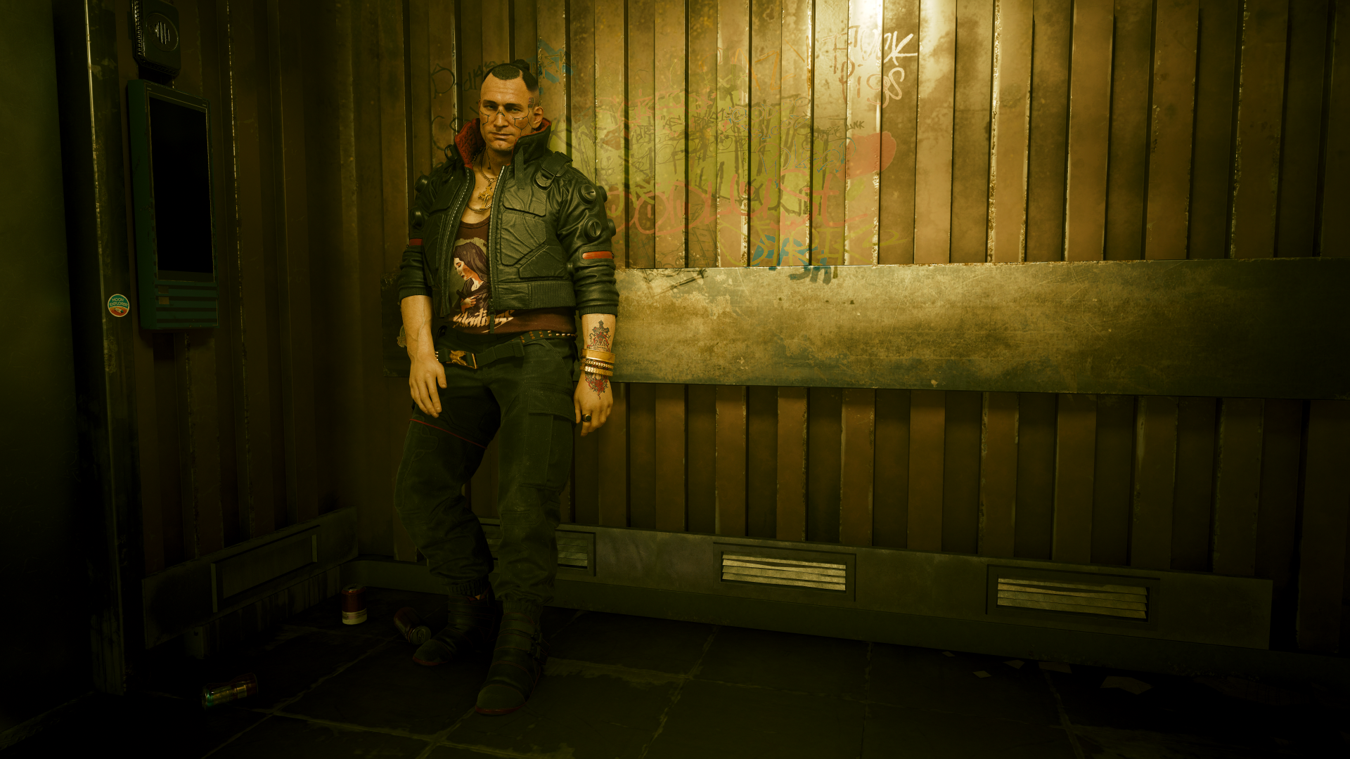 Jackie Welles wears a dark take on Kitsch with shades of Entropism. He wears a black leather-like jacket with high collars with red lining. There are angular pattern panels with arm studs that look like suction cups, but may be a protective element. Underneath, he wears a burgundy tank top with a graphic that may be religious, grommeted web belt, black cargo pants, and black boots.